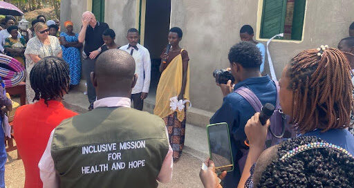 Inauguration of house constructed for a poor family